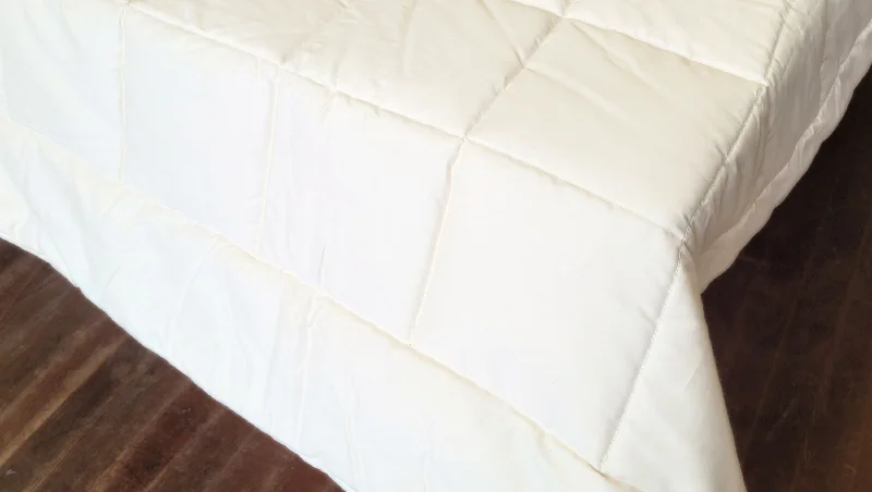 Goose down comforters known for their superior quality and insulationOrganic Quilted Cotton Comforter Goose down comforters known for their superior quality and insulationOrganic Quilted Cotton Comforter
