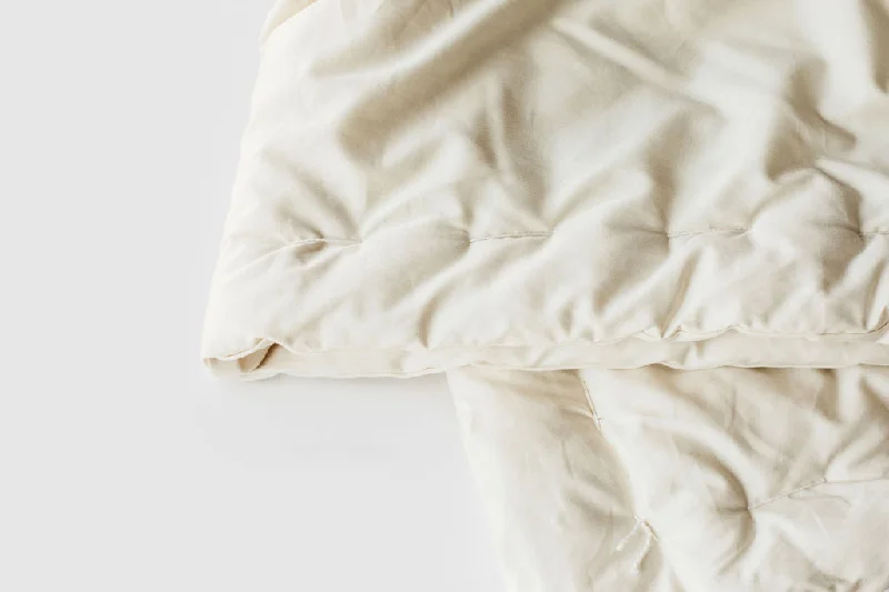 Goose down comforters known for their superior quality and insulationCertified Organic Wool Comforter Goose down comforters known for their superior quality and insulationCertified Organic Wool Comforter