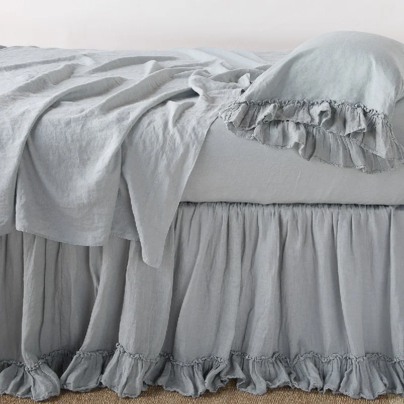 Bed skirts with a tropical print for a vacation - inspired feelLinen Whisper Bed Skirt