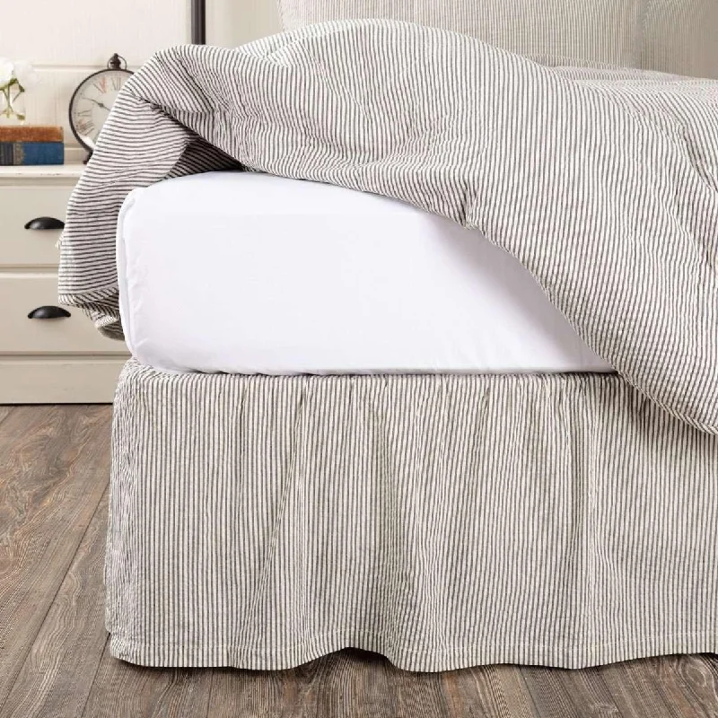 Bed skirts with a scalloped hem for a charming detailHatteras Seersucker Blue Ticking Stripe Bed Skirts VHC Brands