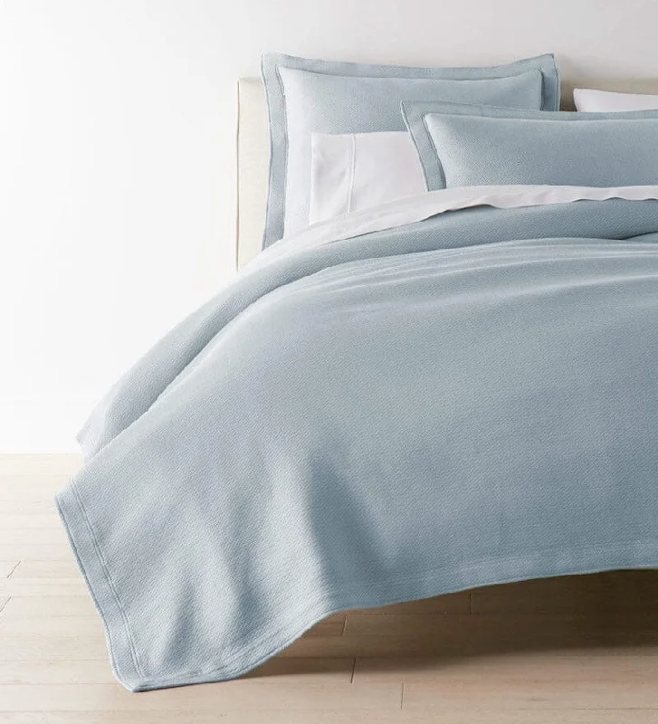 Wool blankets with natural warmth and insulationRayon from bamboo blankets for a silky and breathable feelAngie Blue Stonewashed Matelassé Coverlet by Peacock Alley