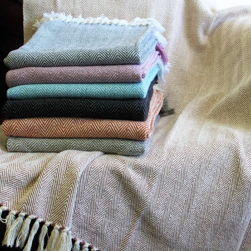 Wool blankets with natural warmth and insulationCashmere blankets for ultimate softness and luxuryFabstyles Herringbone Stripe Cotton Throw Blanket With Fringes