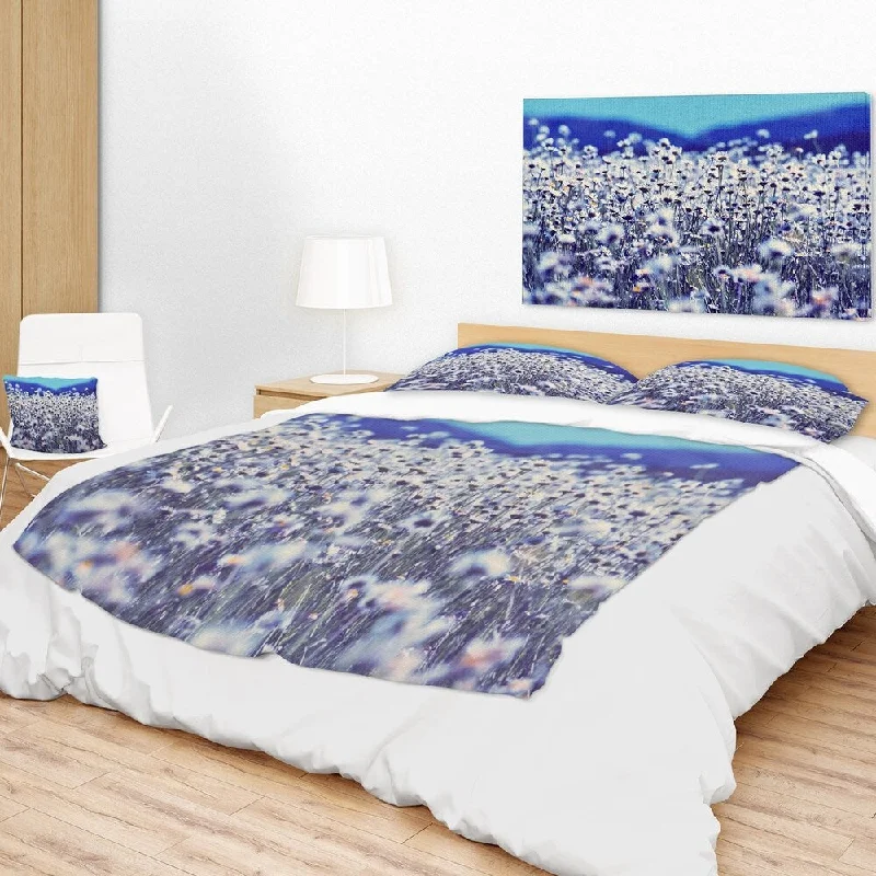 Cashmere blankets for ultimate softness and luxuryRayon from bamboo blankets for a silky and breathable feelDesignart 'Amazing Light Blue Chamomile Blossom' Flower Throw Blanket