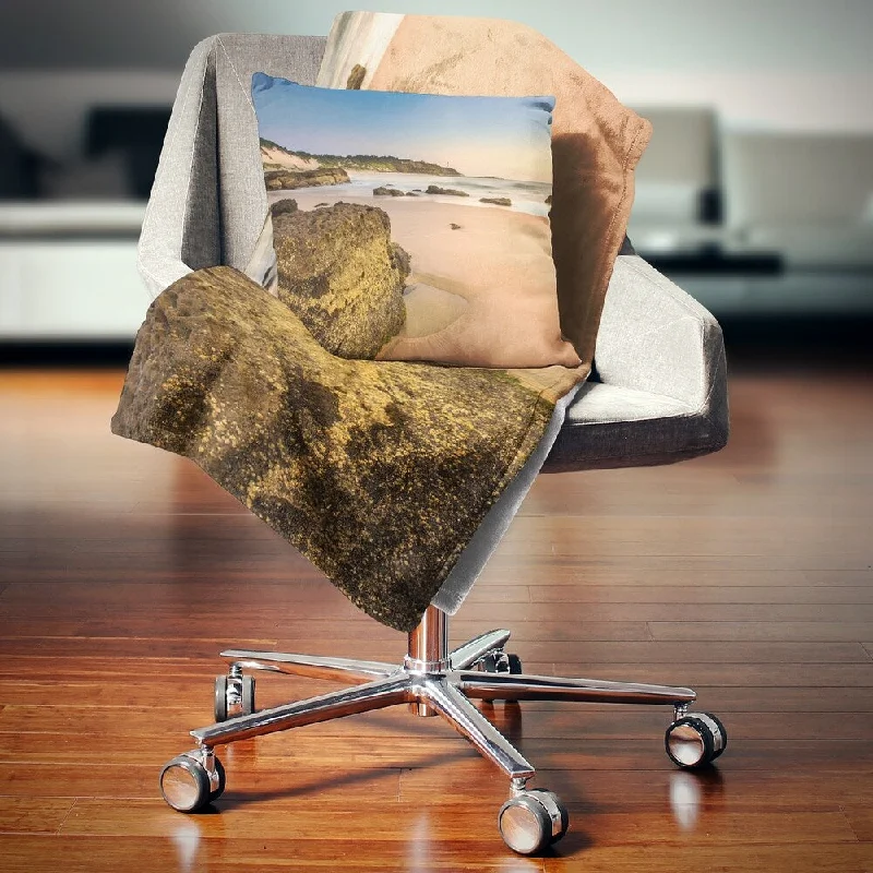 Silk blankets with a smooth and elegant touchAcrylic blankets for a soft and affordable alternativeDesignart 'Beautiful Rocky Seashore at Norah Head' Seashore Throw Blanket