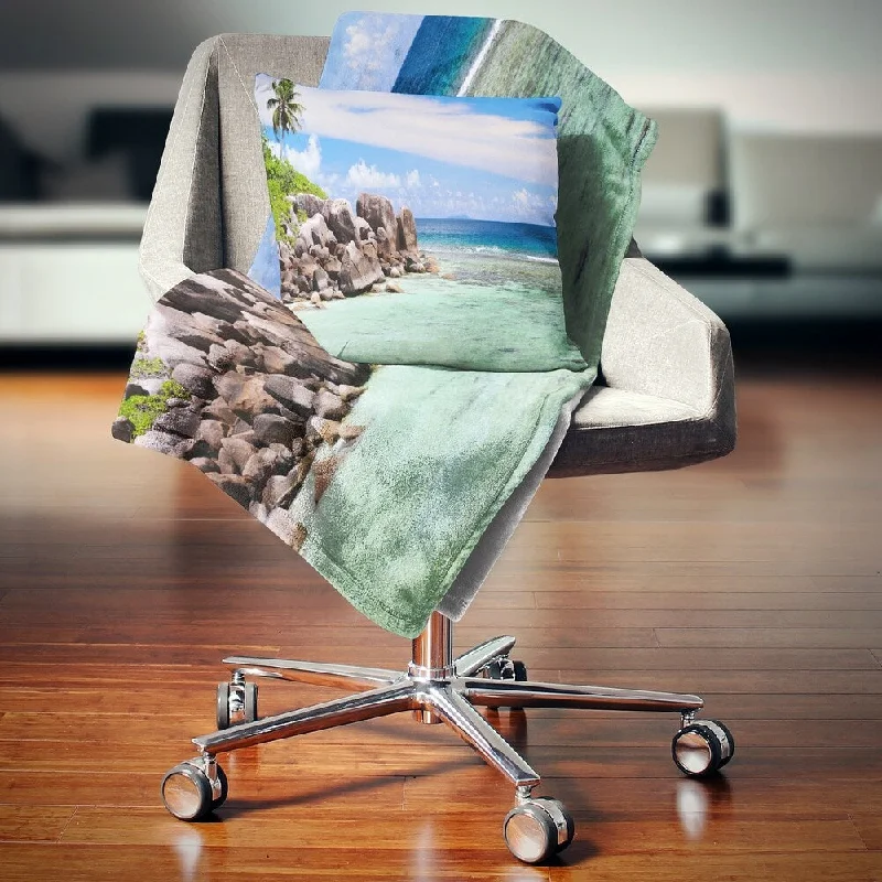 Recycled polyester blankets for an eco - conscious optionWool blankets with natural warmth and insulationDesignart 'Beautiful Seychelles Rocky Coast' Landscape Fleece Throw Blanket