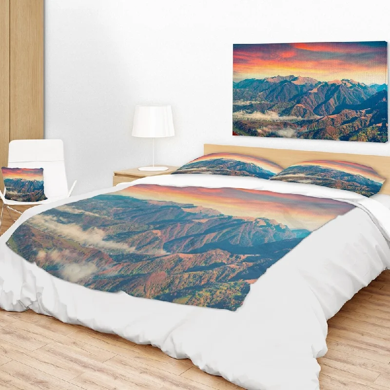 Fleece blankets for a cozy and plush textureSilk blankets with a smooth and elegant touchDesignart 'Kolochava Village in Morning Landscape' Photography Throw Blanket