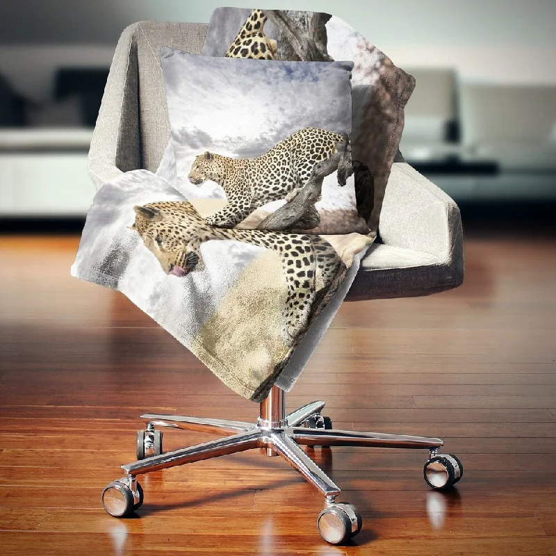 Alpaca wool blankets for a hypoallergenic and warm optionSilk blankets with a smooth and elegant touchDesignart 'Leopard on Tree under Cloudy Sky' African Wall Throw Blanket Alpaca wool blankets for a hypoallergenic and warm optionSilk blankets with a smooth and elegant touchDesignart 'Leopard on Tree under Cloudy Sky' African Wall Throw Blanket