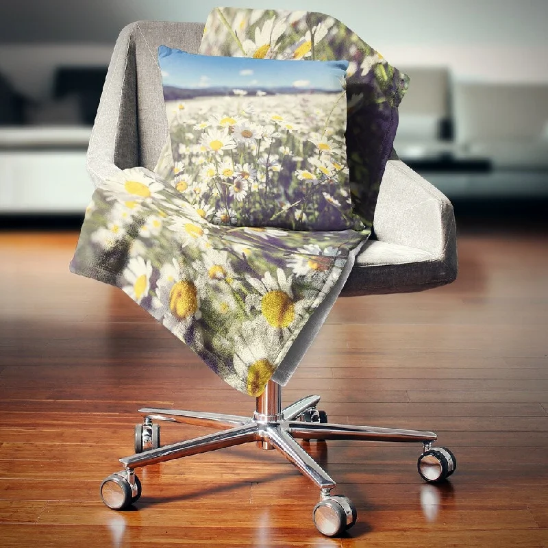 Silk blankets with a smooth and elegant touchMicrofiber blankets that are durable and easy to care forDesignart 'Mountain Plain with Daisy Flowers' Flower Throw Blanket