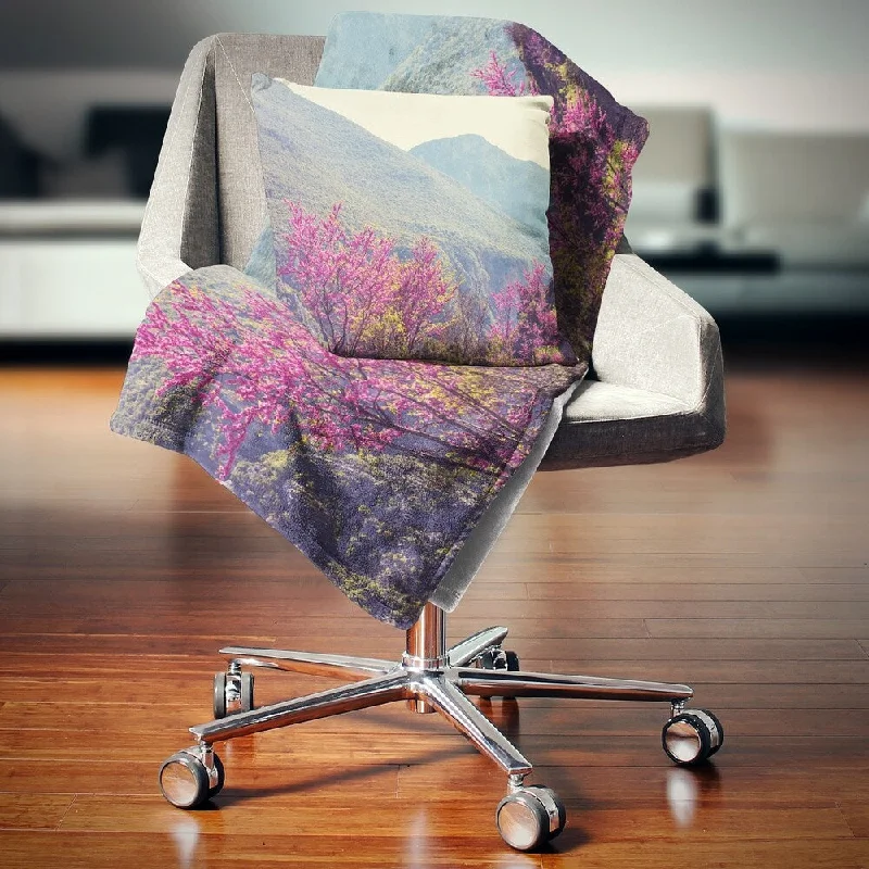 Chenille blankets with a thick and fuzzy textureKing - size blankets to cover large beds comfortablyDesignart 'Pink Blossoming Flowers in Mountains' Floral Throw Blanket