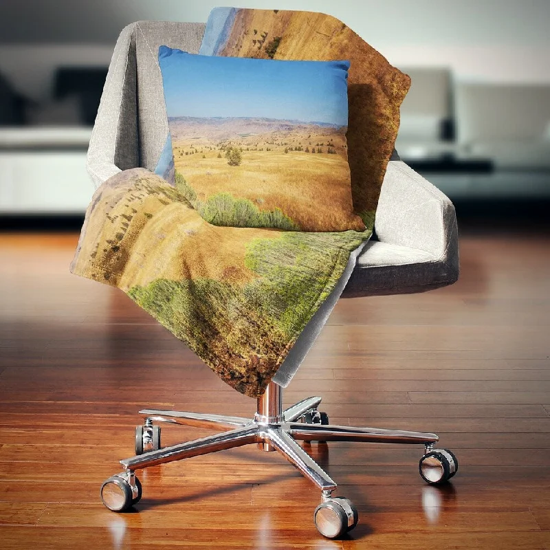 Silk blankets with a smooth and elegant touchAcrylic blankets for a soft and affordable alternativeDesignart 'Prairie with Bright Blue Sky' Landscape Fleece Throw Blanket