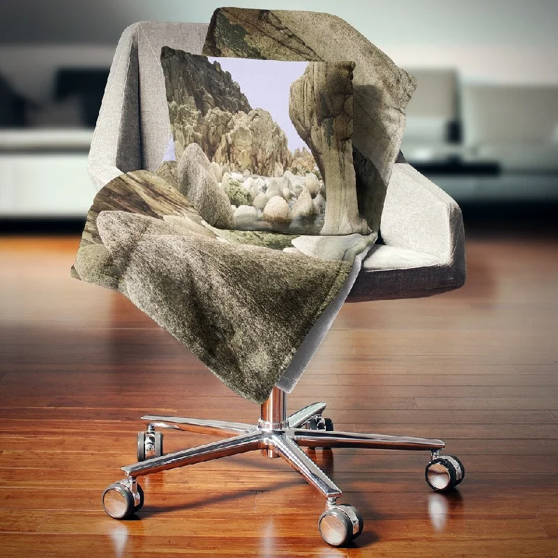 Acrylic blankets for a soft and affordable alternativeQueen - size blankets for standard - sized bedsDesignart 'Smooth Rocks in Coastline Panorama' Landscape Fleece Throw Blanket