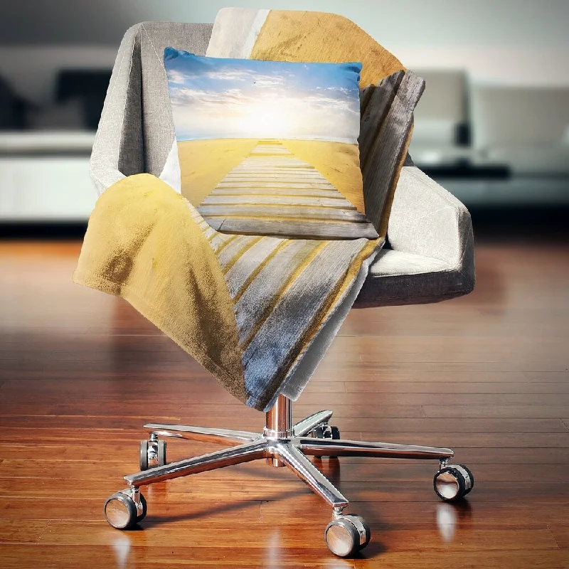 Alpaca wool blankets for a hypoallergenic and warm optionRayon from bamboo blankets for a silky and breathable feelDesignart 'Wooden Road at Blue Sea Beach' Sea Bridge Throw Blanket